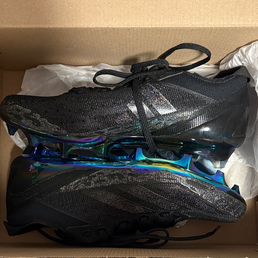 Black Athletic cleats with Iridescent Soles